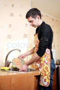 1903548-young-man-washing-dishes-in-the-kitchen-home-work