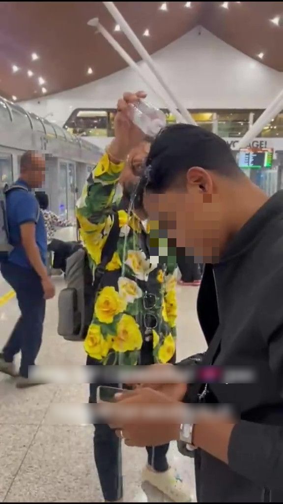 Penumpang VIP Siram Air Botol Pada Sekuriti KLIA, Cuba Berkasar Dengan Pramugari